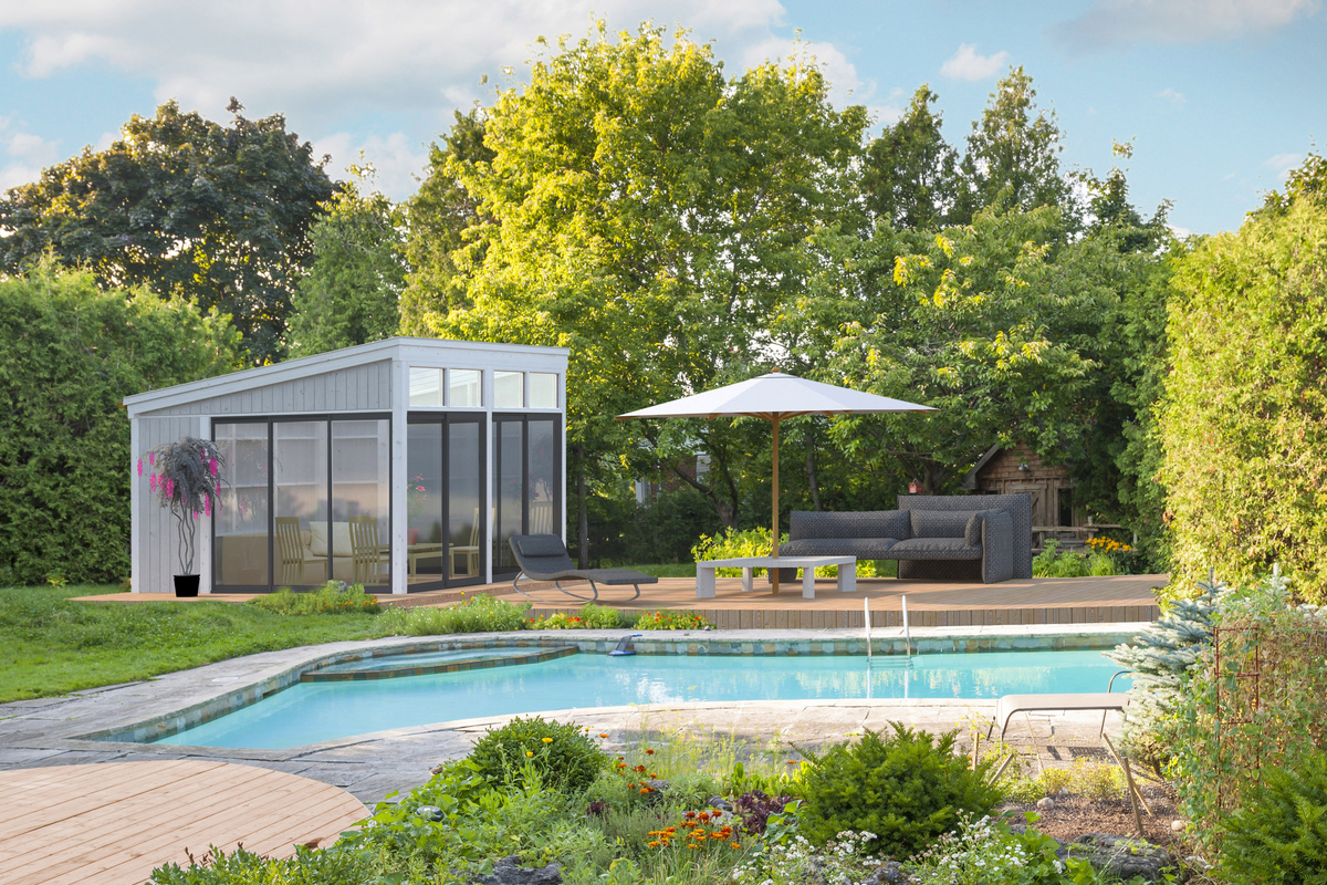 Garden and swimming pool in backyard