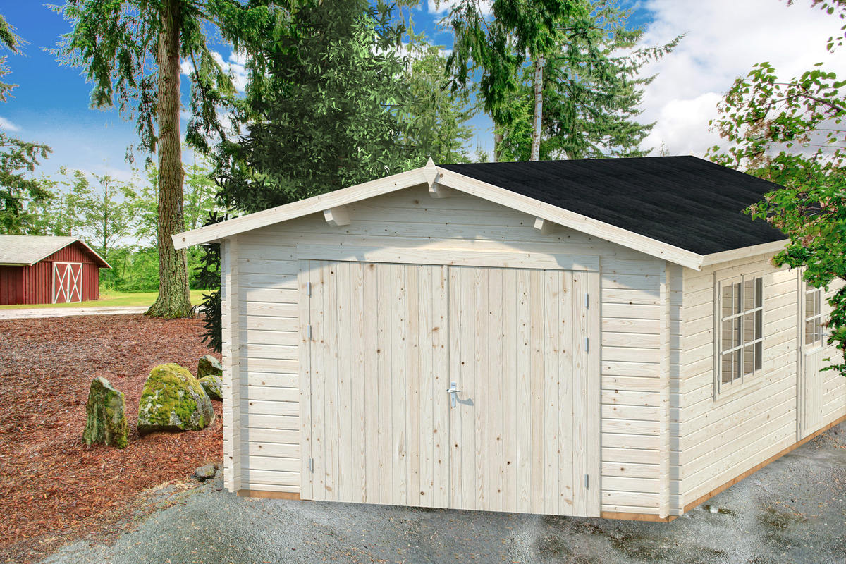 View of garage and wet driveway.