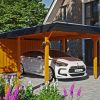 Carport Wendland mit Abstellraum 362 x 870 cm mit EPDM-Dach, schwarze Blende, eiche hell