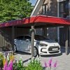 Carport Wendland mit Abstellraum 362 x 870 cm mit EPDM-Dach, rote Blende, schiefergrau