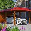 Carport Wendland mit Abstellraum 362 x 870 cm mit EPDM-Dach, rote Blende, nussbaum
