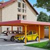 Carport Wendland mit Abstellraum 630 x 879 cm mit EPDM-Dach, rote Blende, eiche hell Carport Wendland mit Abstellraum 630 x 879 cm mit EPDM-Dach, rote Blende, eiche hell